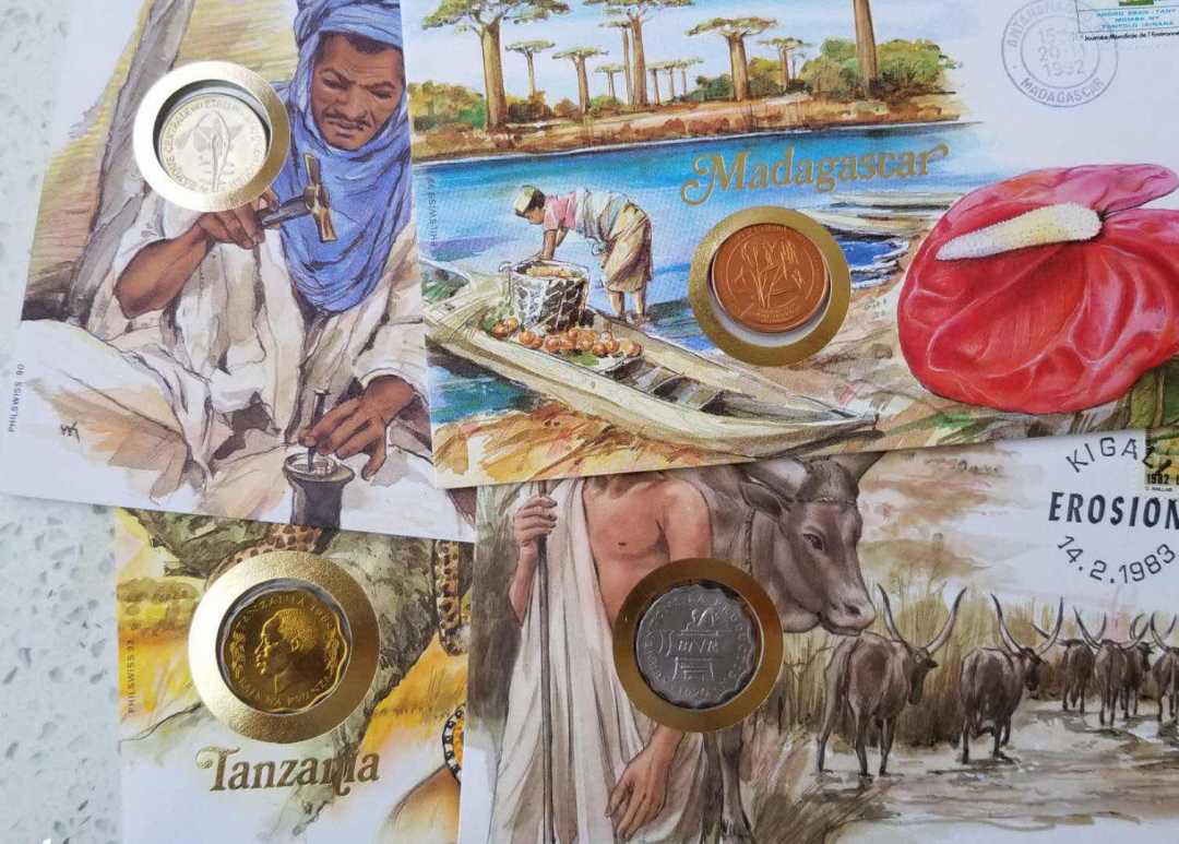 【币观天下】第七十六期拍卖 邮币封一组4枚:坦桑尼亚，尼日尔，卢旺达和马达加斯加。
