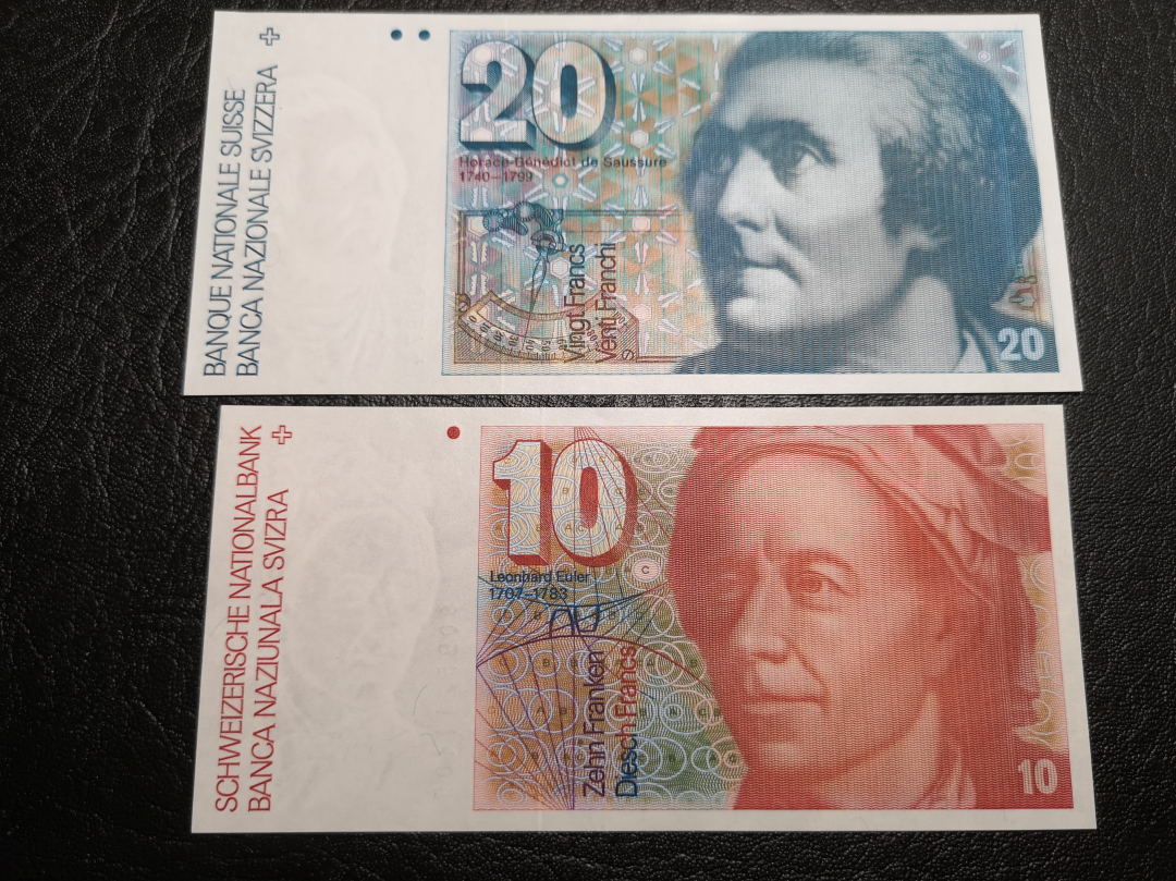 《外钞收藏家》第七十一期拍卖 瑞士人像版 20、10法郎两张  绝品