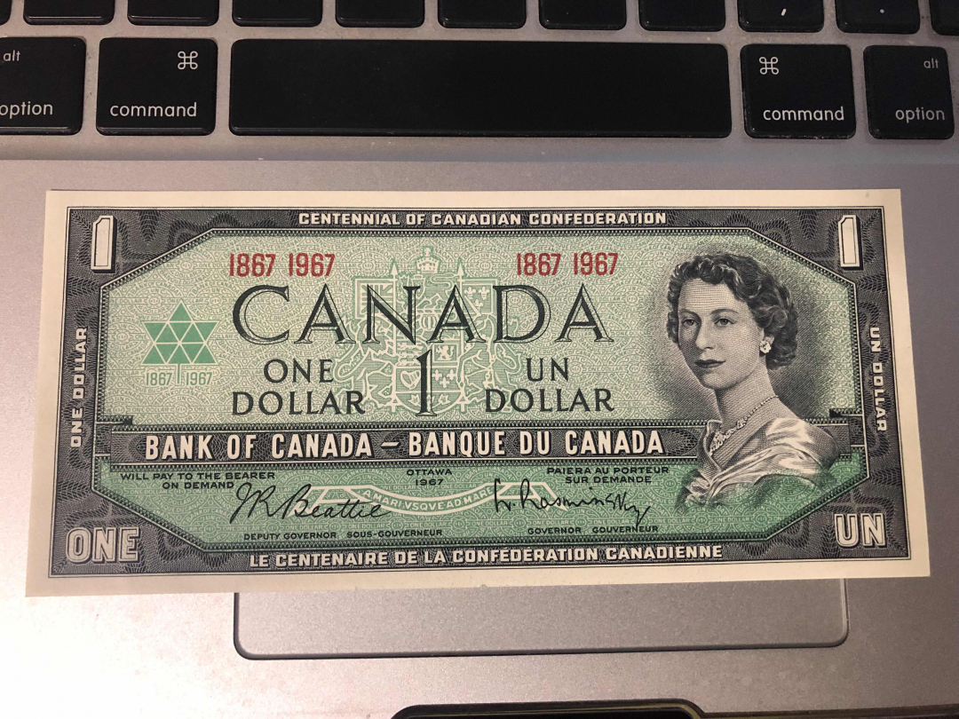 收藏联盟第九十四期拍卖 1967年加拿大100周年纪念钞1元 UNC-角有软折