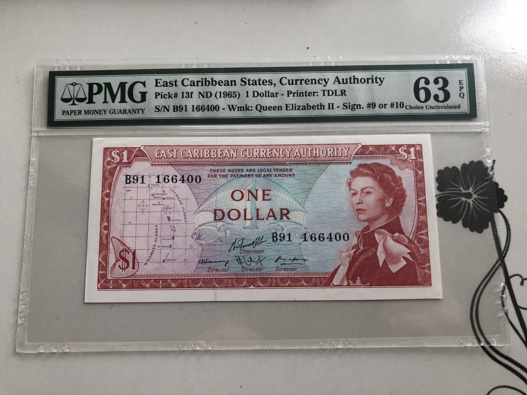 收藏联盟第九十四期拍卖 1965年东加勒比1元 PMG63E