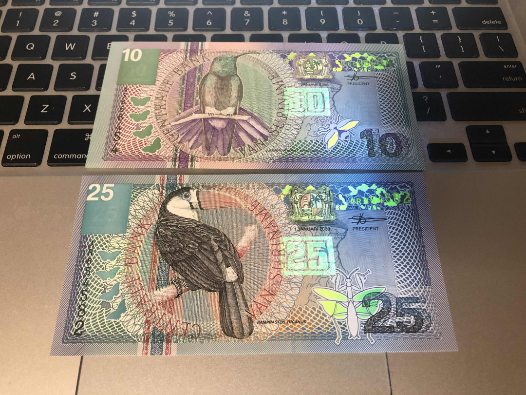 收藏联盟第九十四期拍卖 苏里南10，25盾；萨尔瓦多5克朗的unc