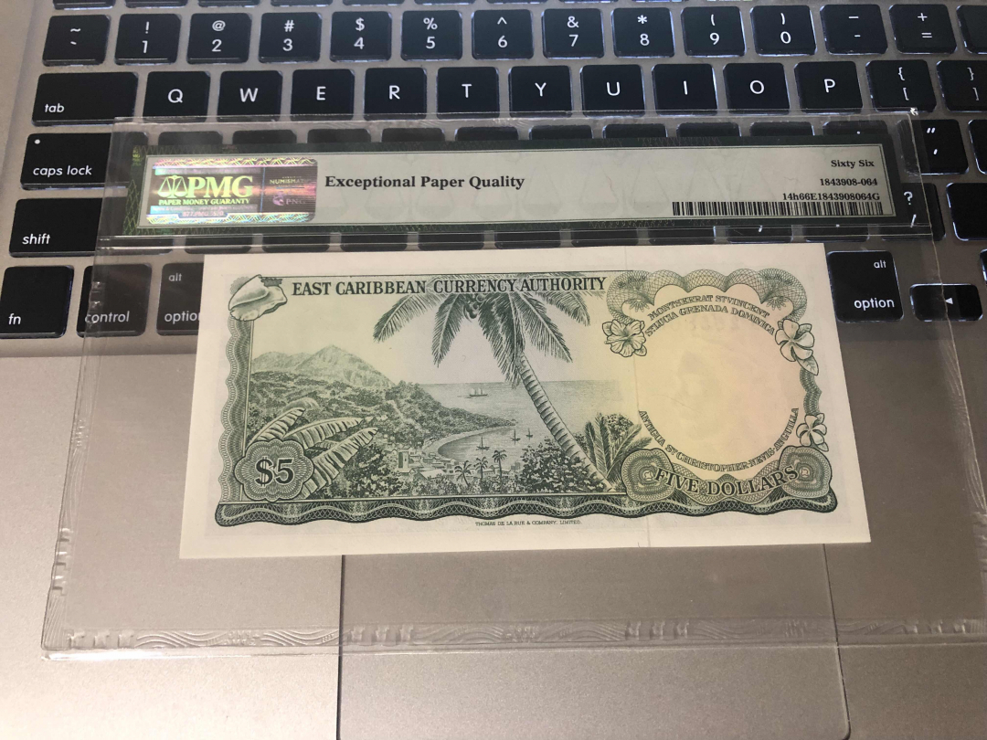 收藏联盟第九十四期拍卖 1965年东加勒比5元 PMG66E