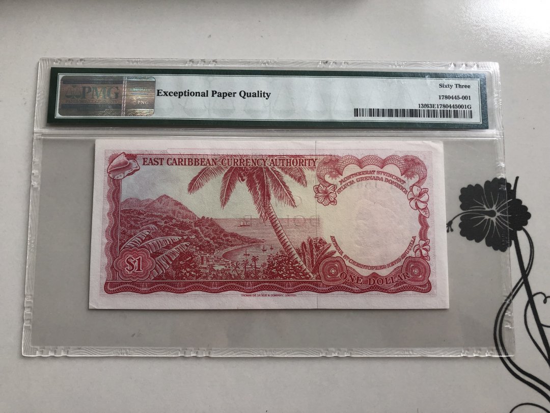 收藏联盟第九十四期拍卖 1965年东加勒比1元 PMG63E