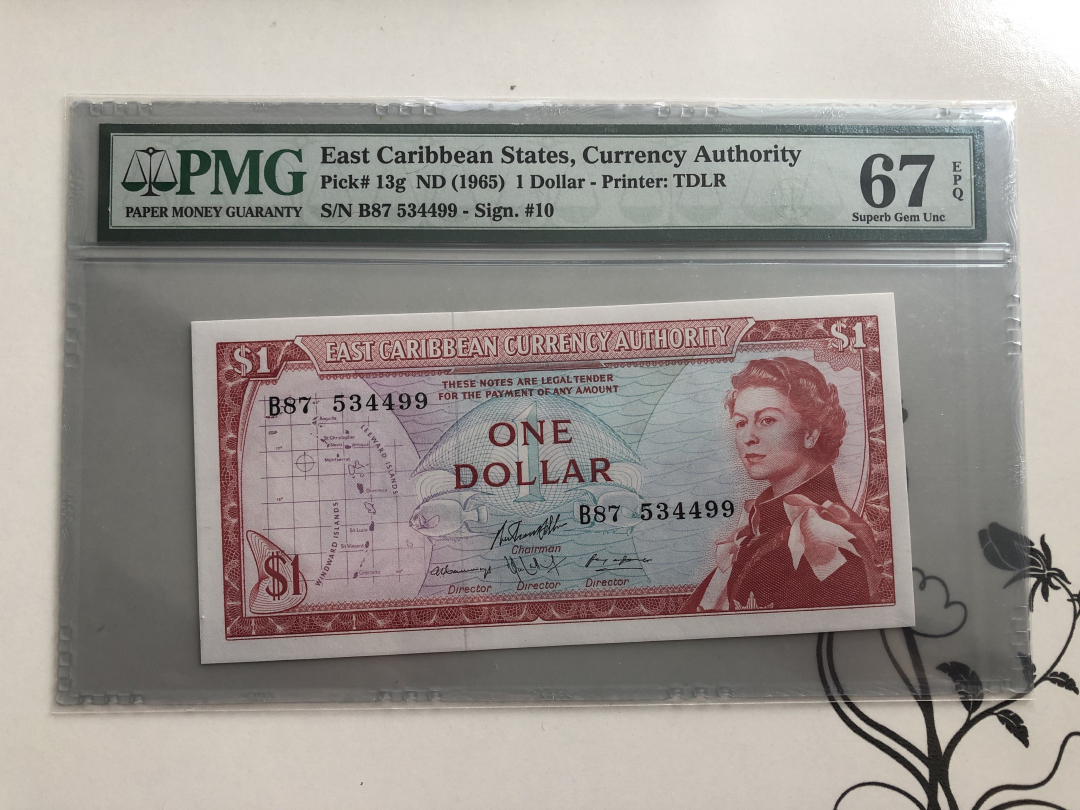 收藏联盟第九十四期拍卖 1965年东加勒比1元 PMG67E