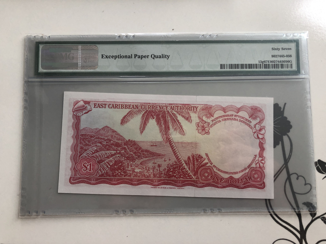 收藏联盟第九十四期拍卖 1965年东加勒比1元 PMG67E