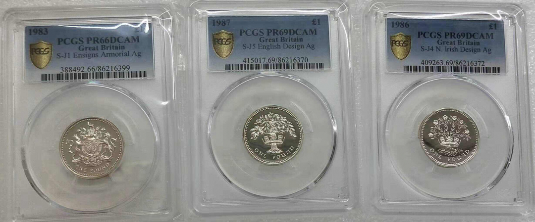 小魏钱币第29期中外金银币专场  PCGS PR69 66 英国1镑精制银币3枚 1983，1986，1987年，每一枚重9.5克925银 共28.5克