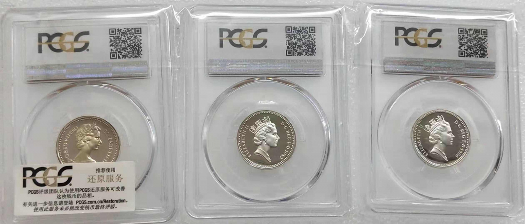 小魏钱币第29期中外金银币专场  PCGS PR69 66 英国1镑精制银币3枚 1983，1986，1987年，每一枚重9.5克925银 共28.5克