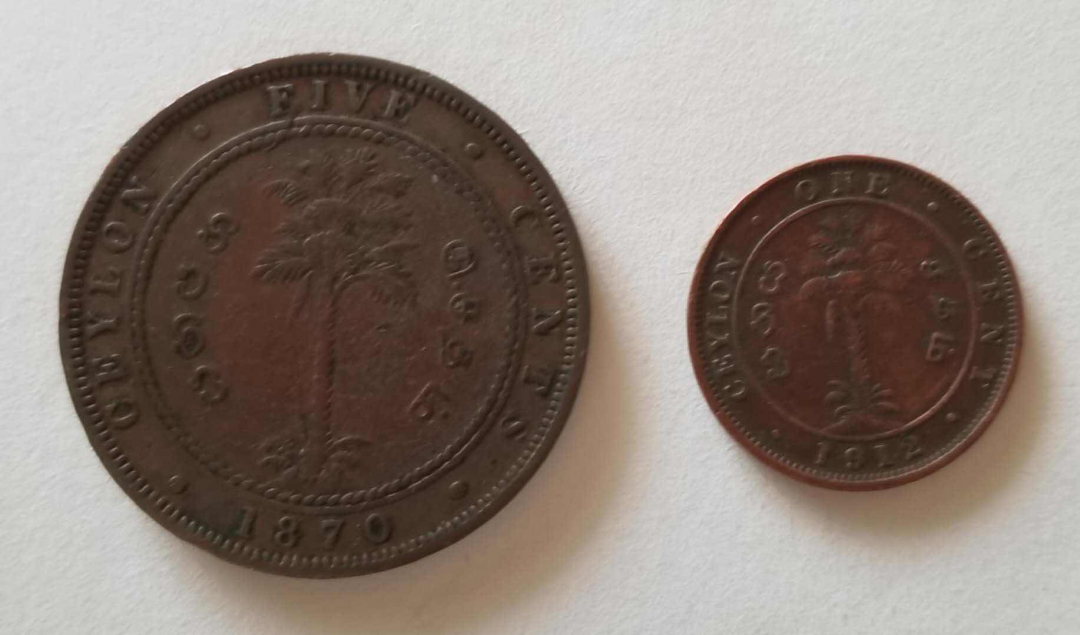 【币观天下】第七十八期拍卖 锡兰1870年5分1912年1分铜币两枚，品如图。