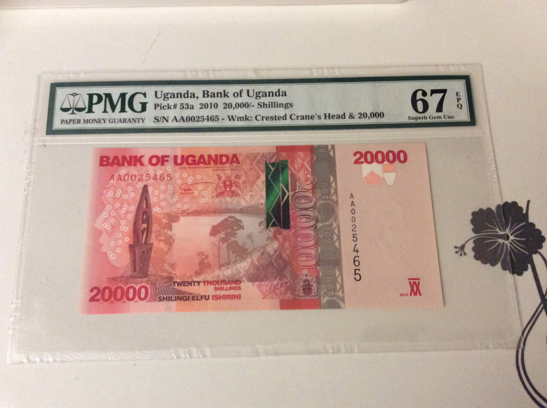 【收藏联盟】第九十九期拍卖 乌干达 2010年 20000先令 p53a  PMG66EPQ  AA冠