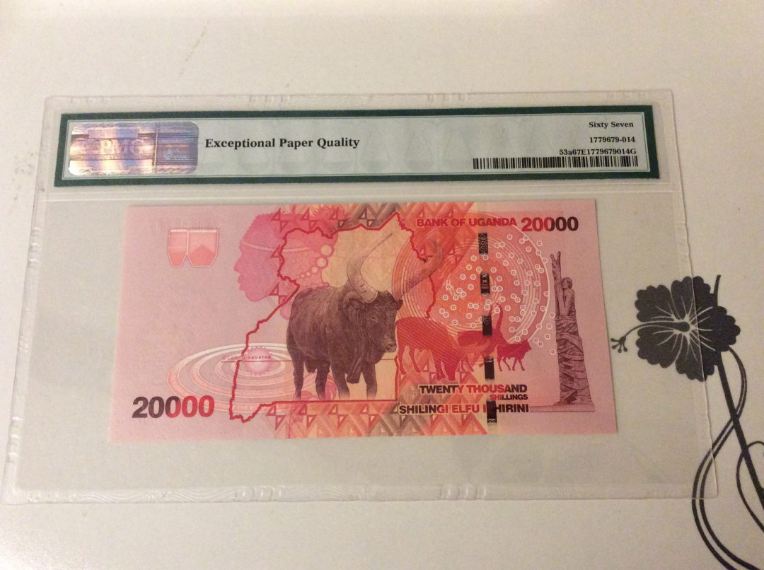 【收藏联盟】第九十九期拍卖 乌干达 2010年 20000先令 p53a  PMG66EPQ  AA冠