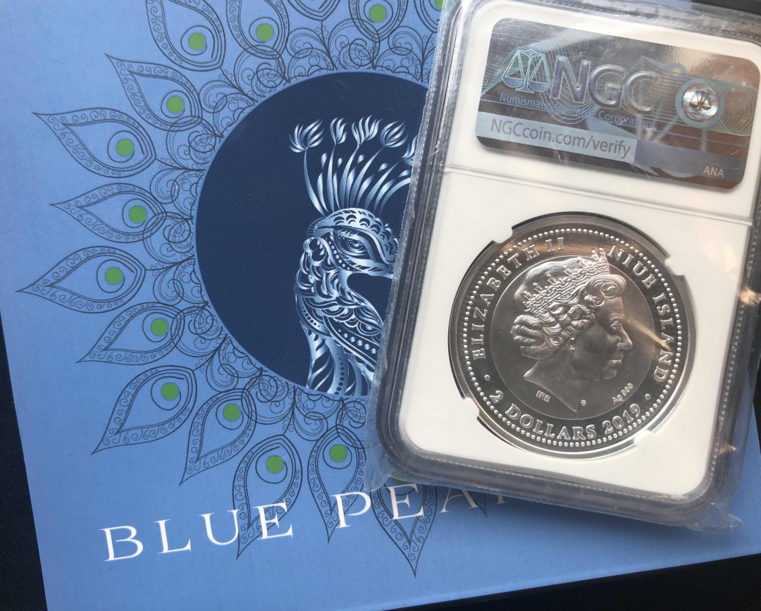 【币观天下】第八十四期钱币拍卖 【纽埃】纽埃蓝标孔雀银币【ngc70】