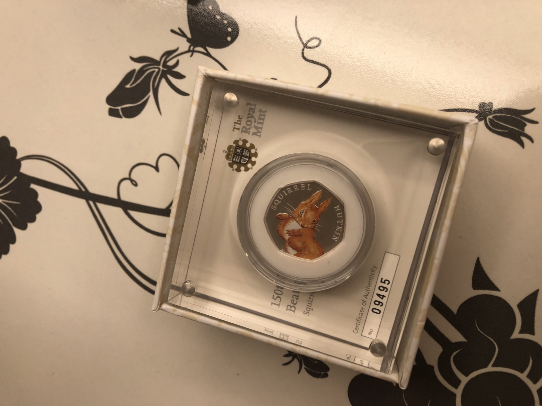 【收藏联盟】第九十九期拍卖 英国2016年彼得兔150周年松鼠六边形彩色精制银币·原盒证书