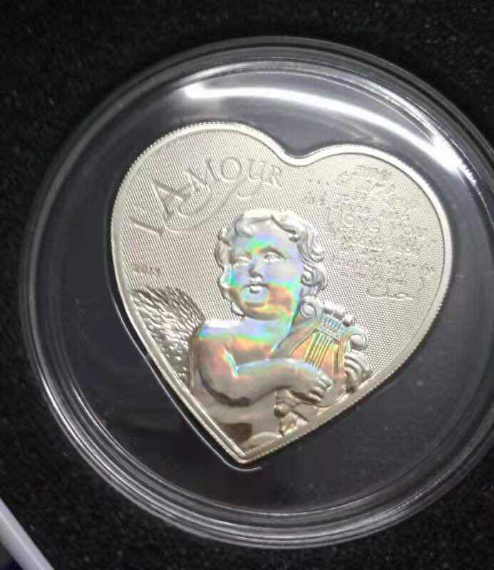 【币观天下】第八十四期钱币拍卖 喀麦隆2013年1000法郎，“天使之爱我爱你”高浮雕 激光全息幻彩 心形异形精制银币