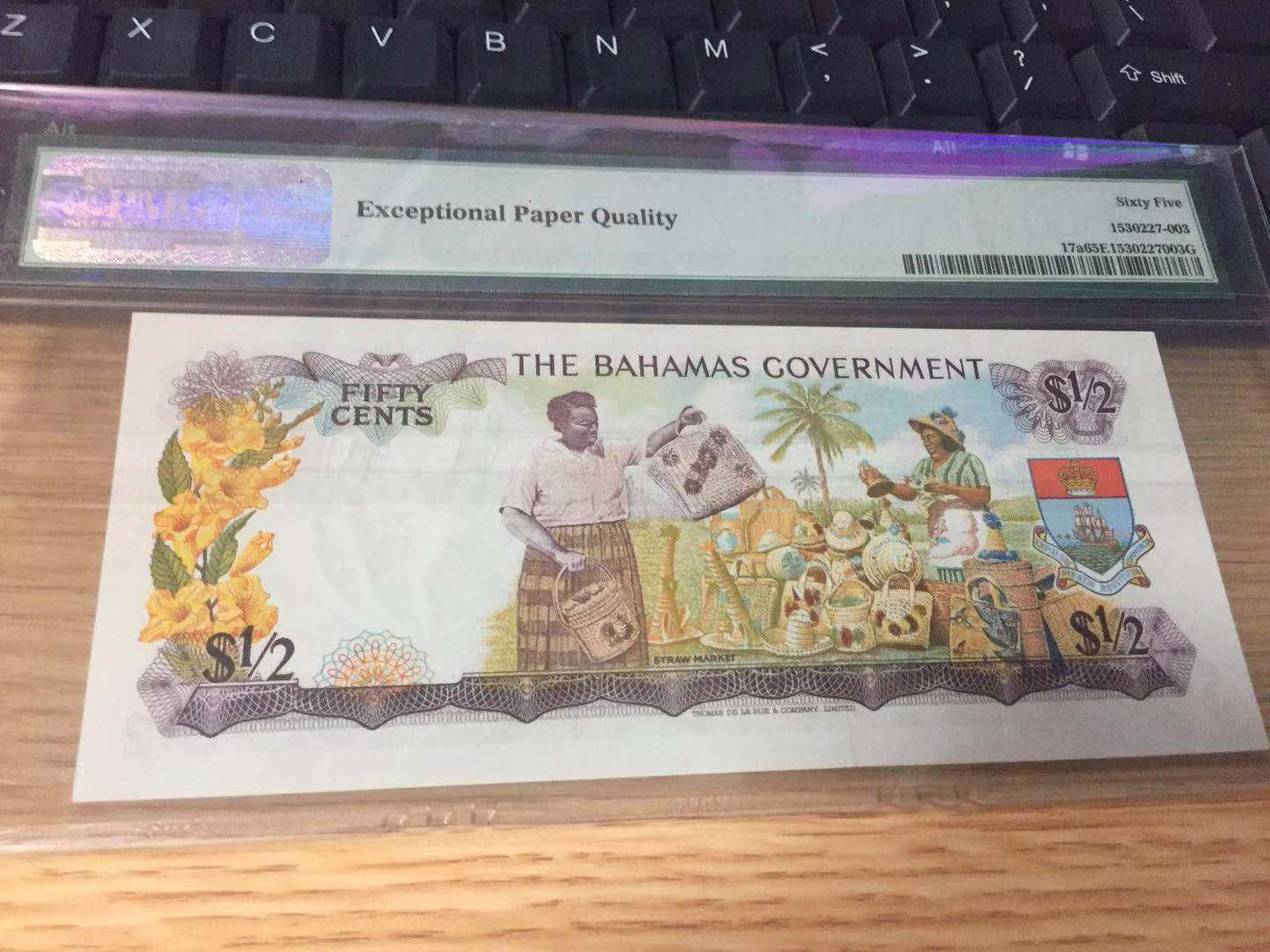 CICE展销会【收藏联盟】第100期拍卖——921感恩大拍 巴哈马 1965年 1/2元 经典彩背 初版 女王纸币 PMG65EPQ  绝品 p17a