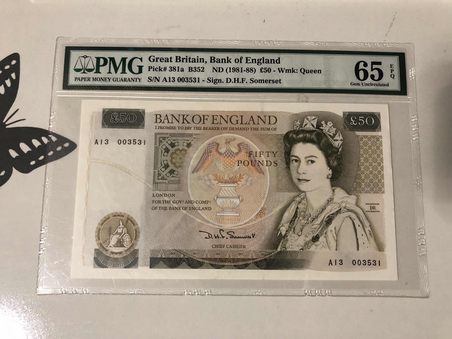 【收藏联盟】第101期拍卖——开启新纪元 英国 1981-88年 50镑 p381a 初版无金属线 PMG65EPQ D.H.F签名