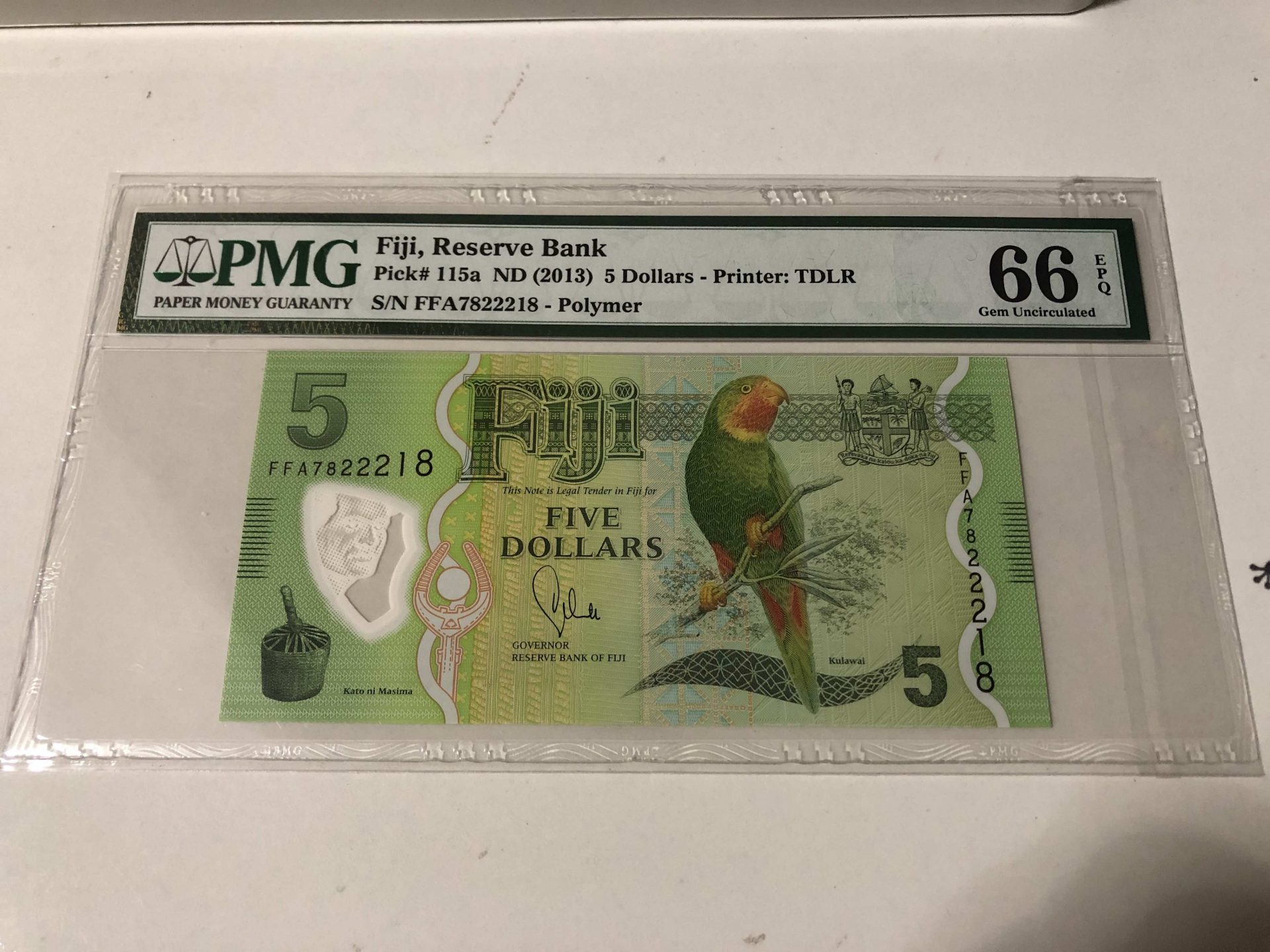 【收藏联盟】第103期拍卖——国庆节专场 斐济 2013年5元 塑料钞 PMG66EPQ 鹦鹉 FFA首发冠
