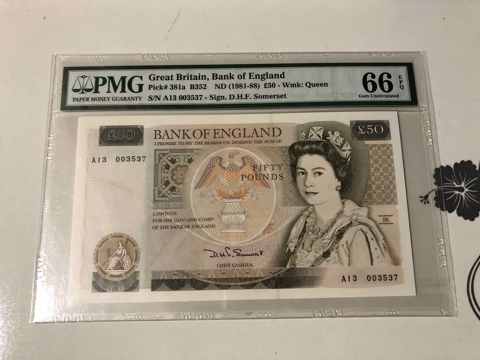 【收藏联盟】第103期拍卖——国庆节专场 英国 1981-88年 50镑 p381a 初版无金属线 PMG66EPQ D.H.F签名