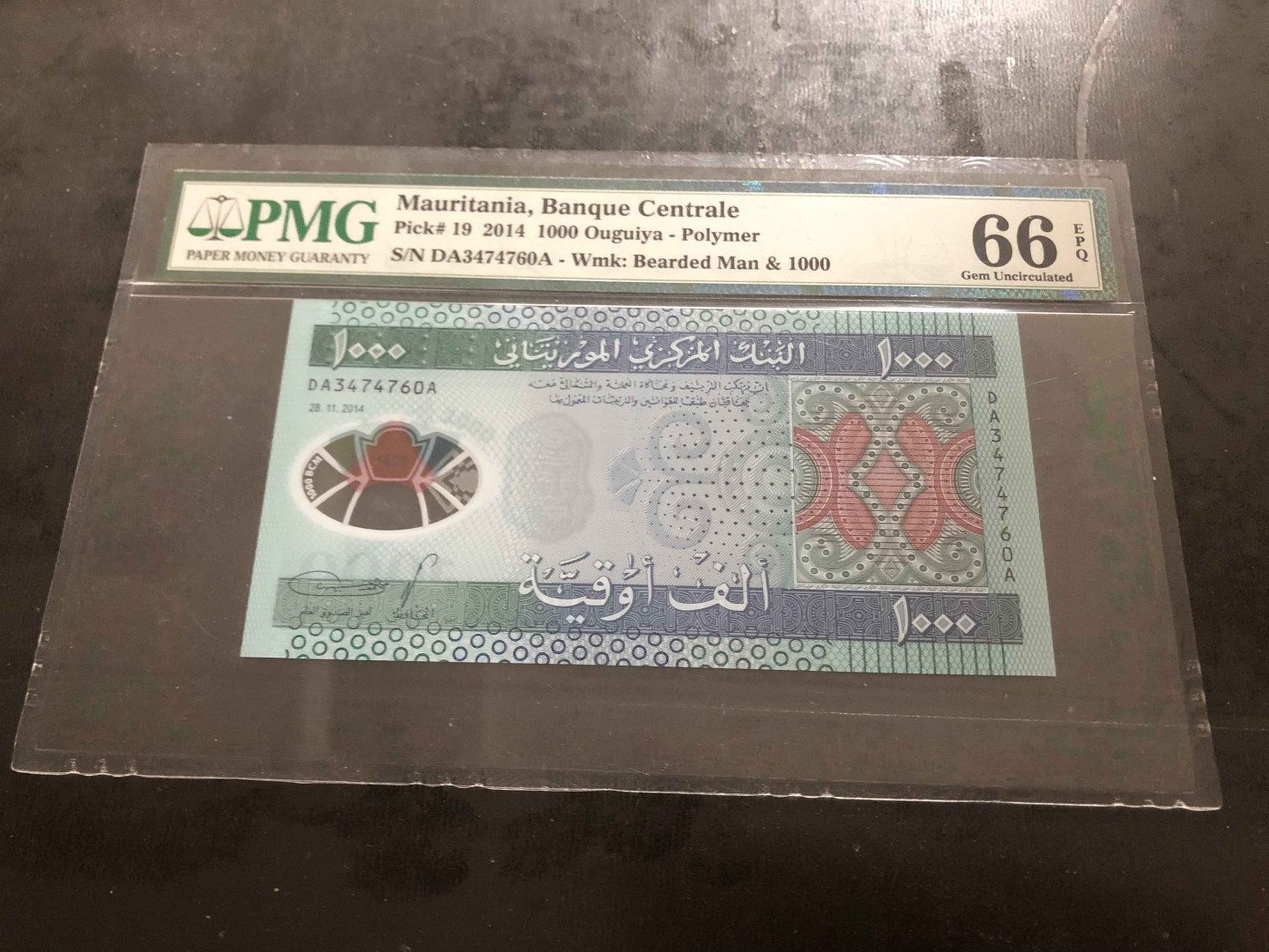 【收藏联盟】第104期拍卖 毛里塔尼亚2014年 1000 乌吉亚 塑料钞 DA 首发冠 PMG66EPQ 
