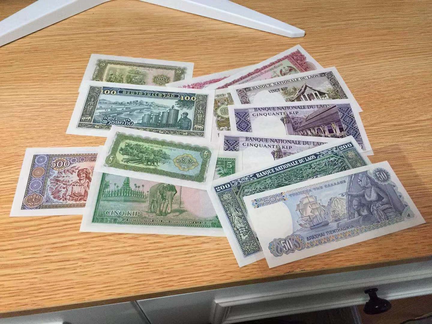 【收藏联盟】第104期拍卖 【一组13张】希腊1978年50德拉克马 靓号：771188 UNC&老挝 1962-79年 1-1000