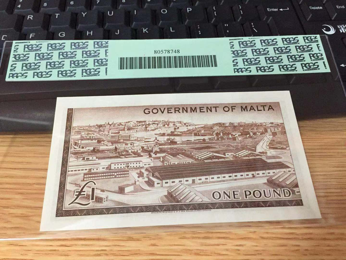 【收藏联盟】第104期拍卖 马耳他 初版 1949版1镑p26a PCGS66EPQ 戎装女王 BWC出品 绝品