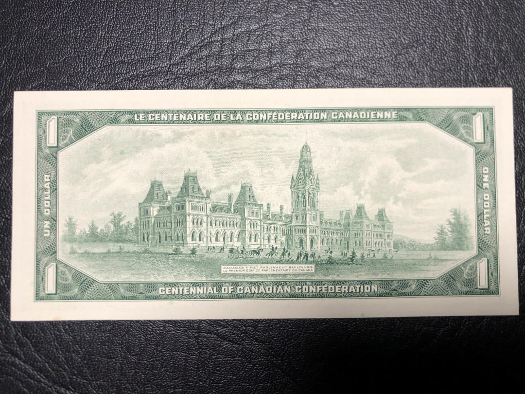 《外钞收藏家》第七十二期拍卖 加拿大1967年1加元  背面非常大气的画面  au品相
