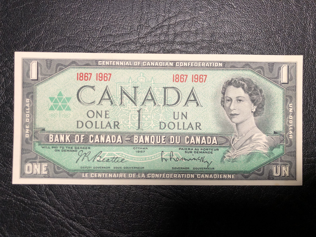 《外钞收藏家》第七十二期拍卖 加拿大1967年1加元  背面非常大气的画面  au品相