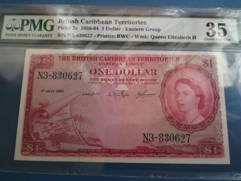 北京国际钱币博览会专场【收藏联盟】第109期拍卖——欧美环游记 【实物状态好】东加勒比 1958-64年 1元 p7c PMG35 大冠女王 BWC经典 精美