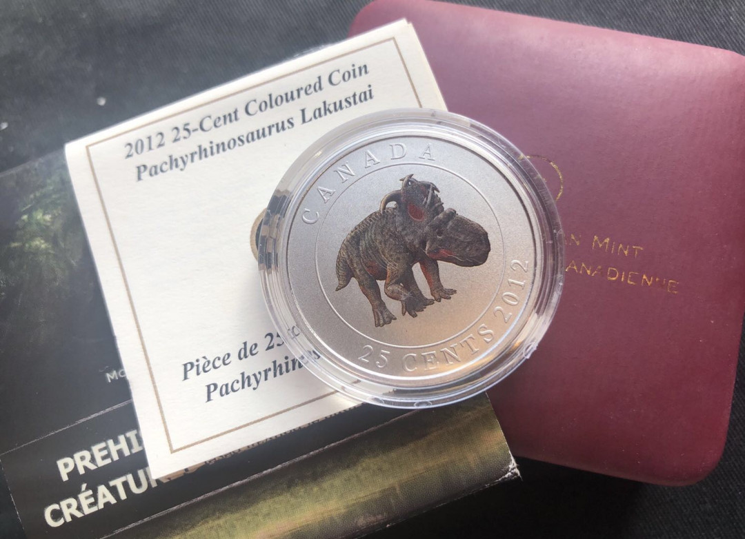【币观天下】第九十一期钱币拍卖-北京国际钱币展专场 【加拿大】加拿大2012年史前动物1恐龙厚鼻龙夜光合金币