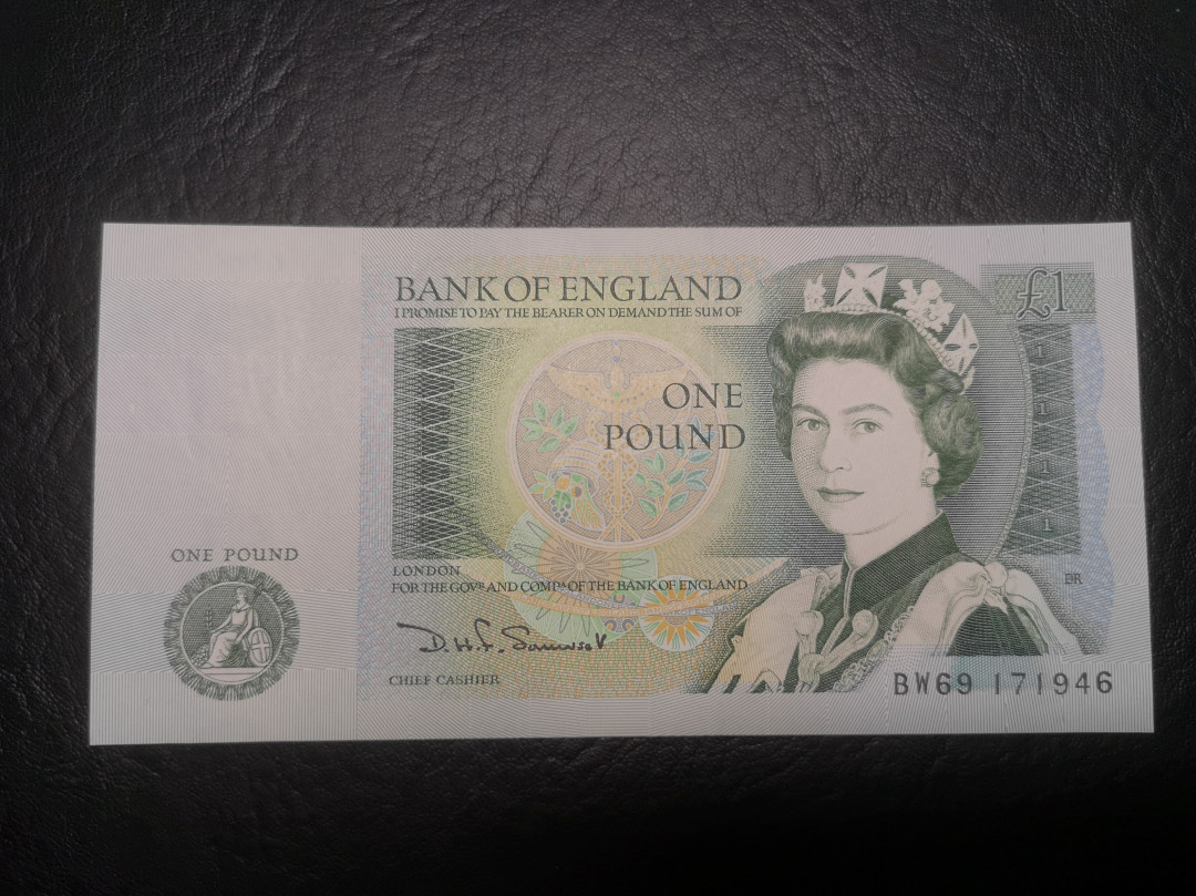 《外钞收藏家》第七十二期拍卖 英国D序列1镑 全新unc