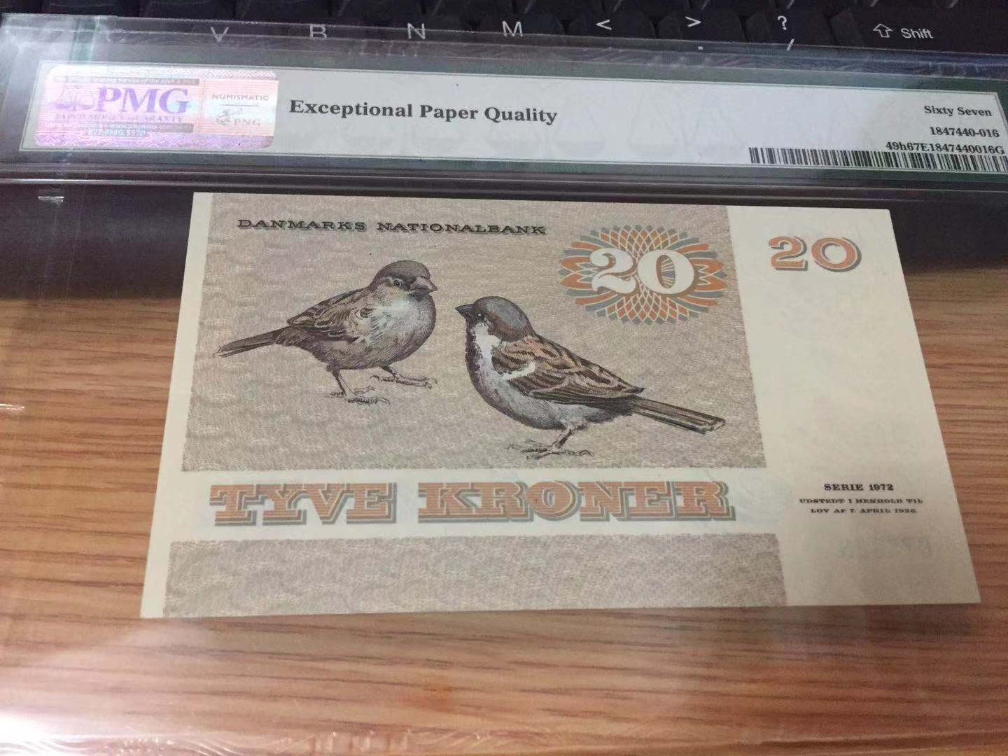 【收藏联盟】第110期拍卖——悠远岛歌 丹麦 1988年 20克朗p49h PMG67EPQ  