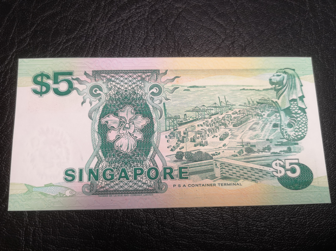 《外钞收藏家》第七十二期拍卖 新加坡船板5元 unc