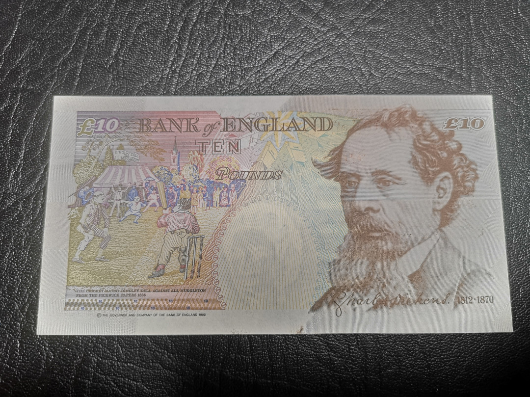 《外钞收藏家》第七十二期拍卖 英国E序列10镑 全新unc
