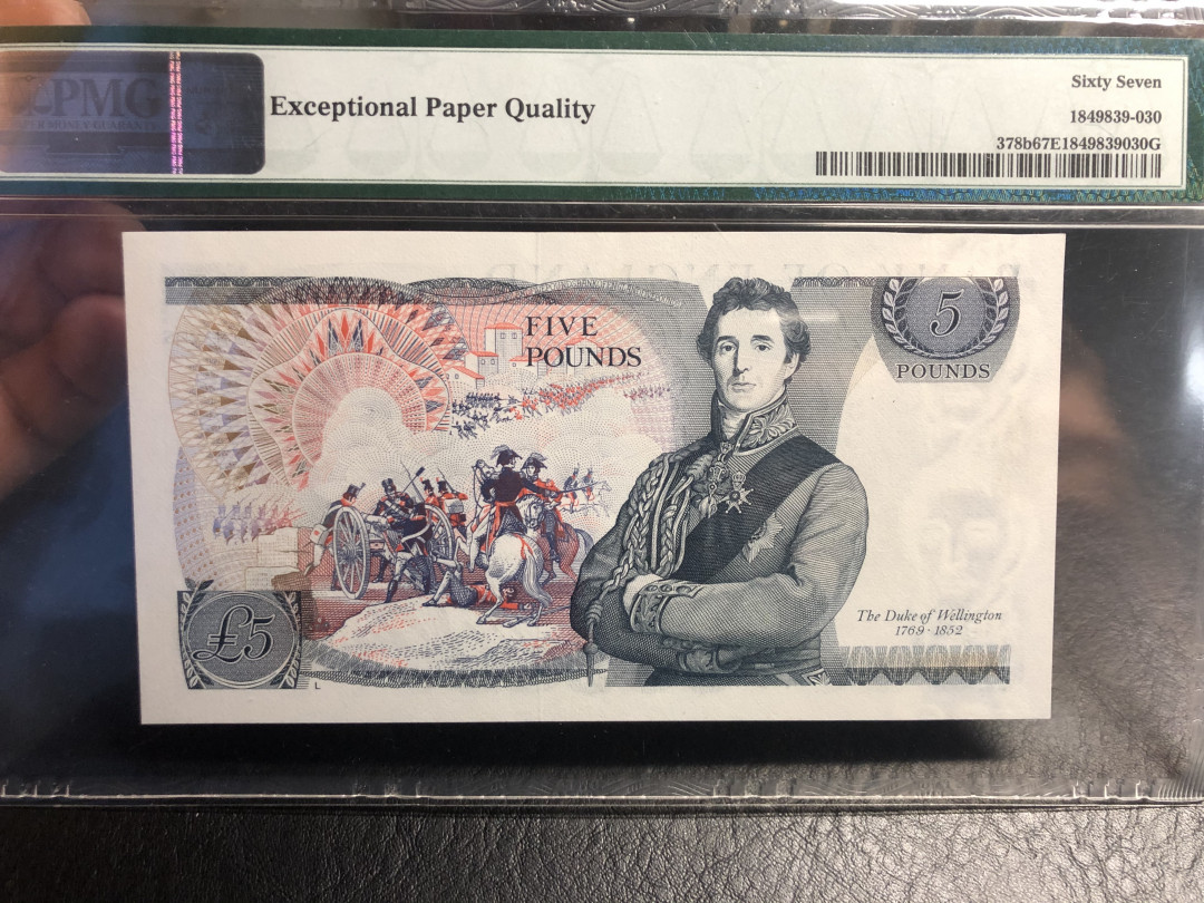 《外钞收藏家》第七十二期拍卖 英国D序列5镑pmg67 378b