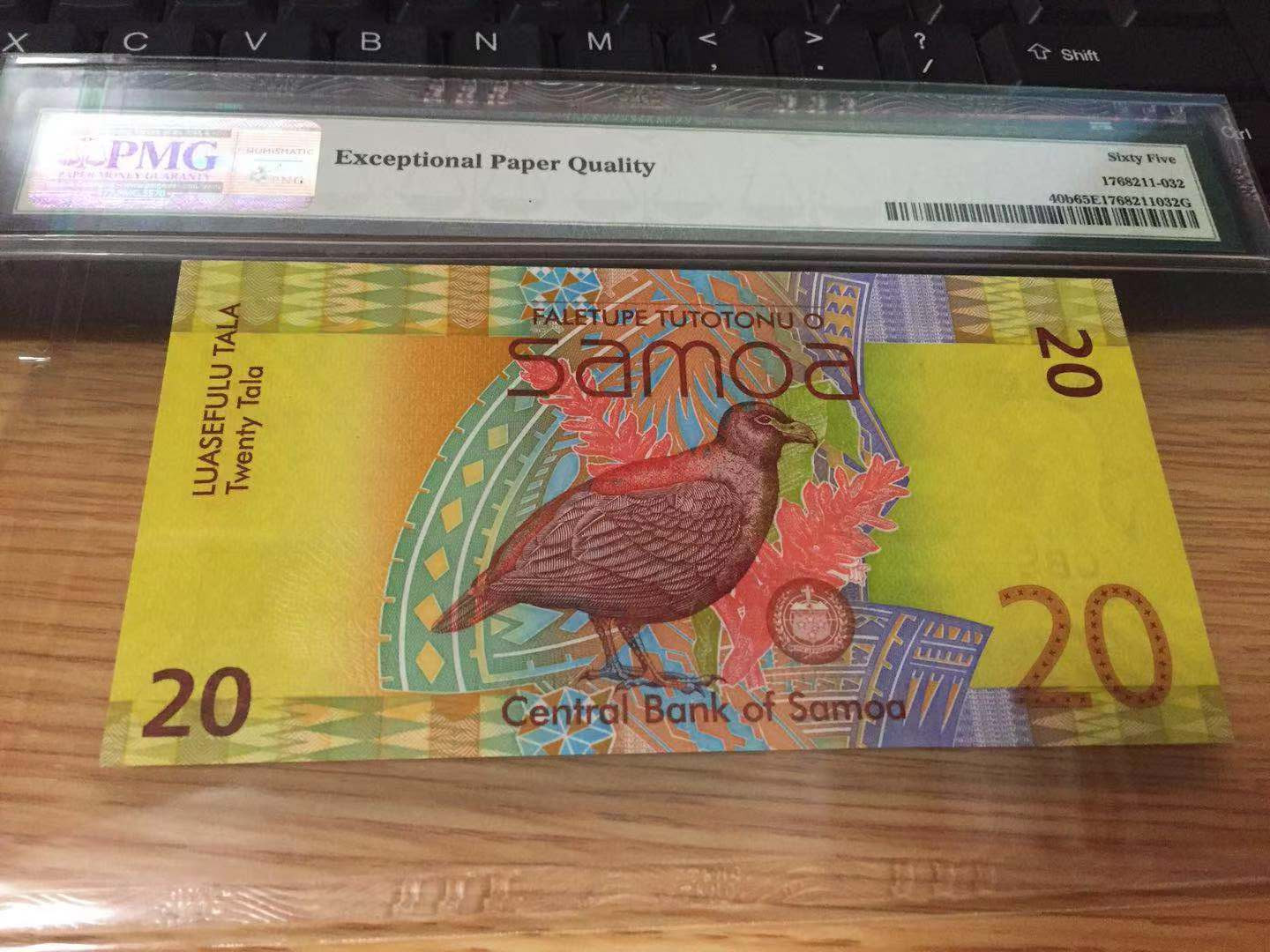 【收藏联盟】第110期拍卖——悠远岛歌 萨摩亚 2014年 20塔拉 p40b 非常漂亮 PMG65EPQ 
