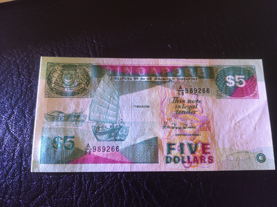 《外钞收藏家》第七十二期拍卖 新加坡船板5元 unc