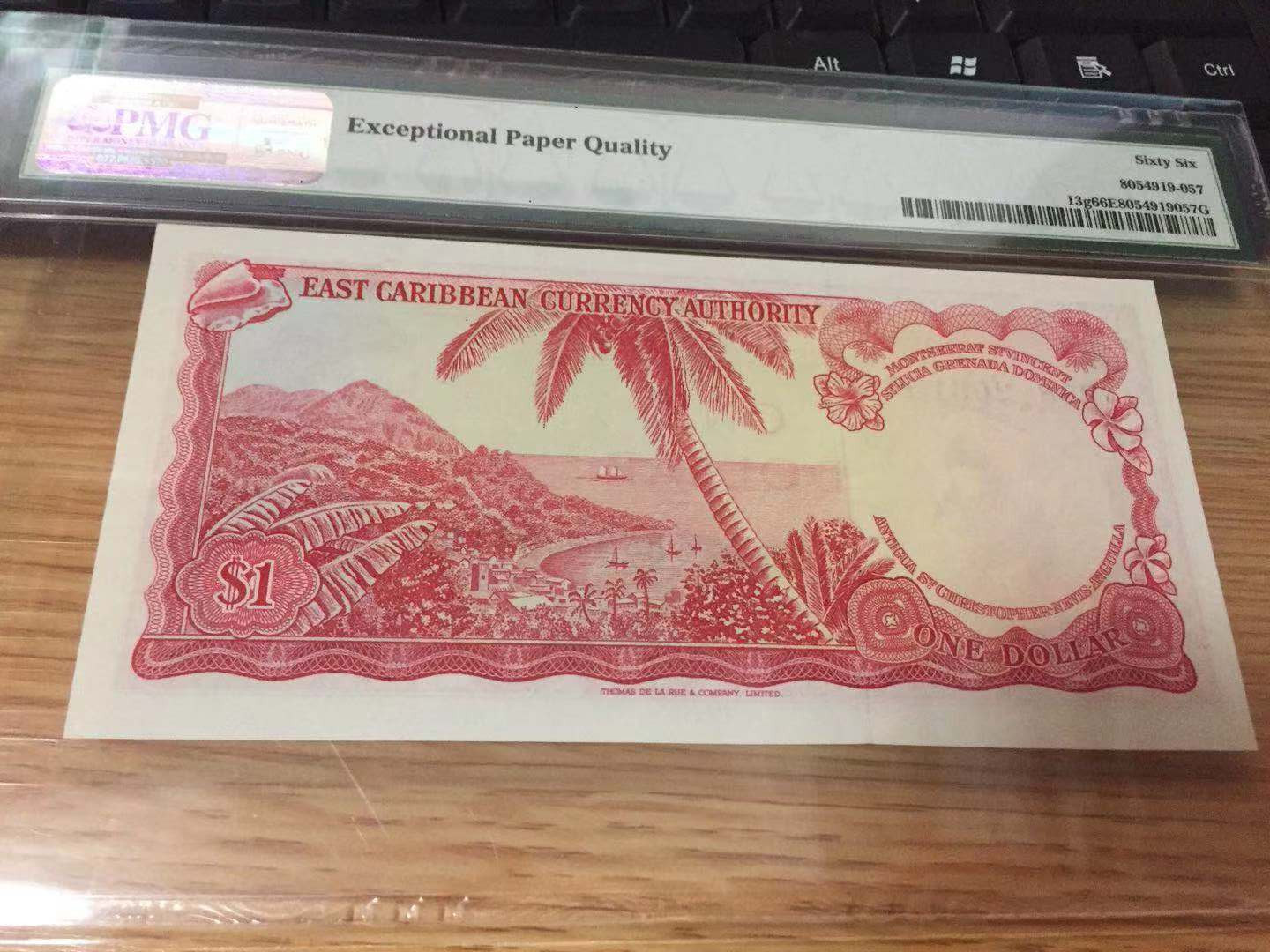 【收藏联盟】第110期拍卖——悠远岛歌 东加勒比 1965年1元PMG66EPQ 戎装女王 