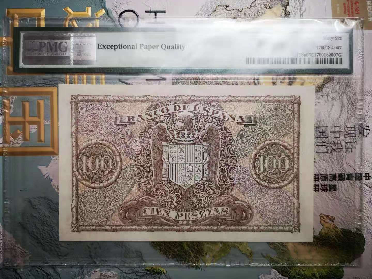 【收藏联盟】第110期拍卖——悠远岛歌 【亚军分】西班牙 1940年 100比塞塔 p118a PMG66EPQ 