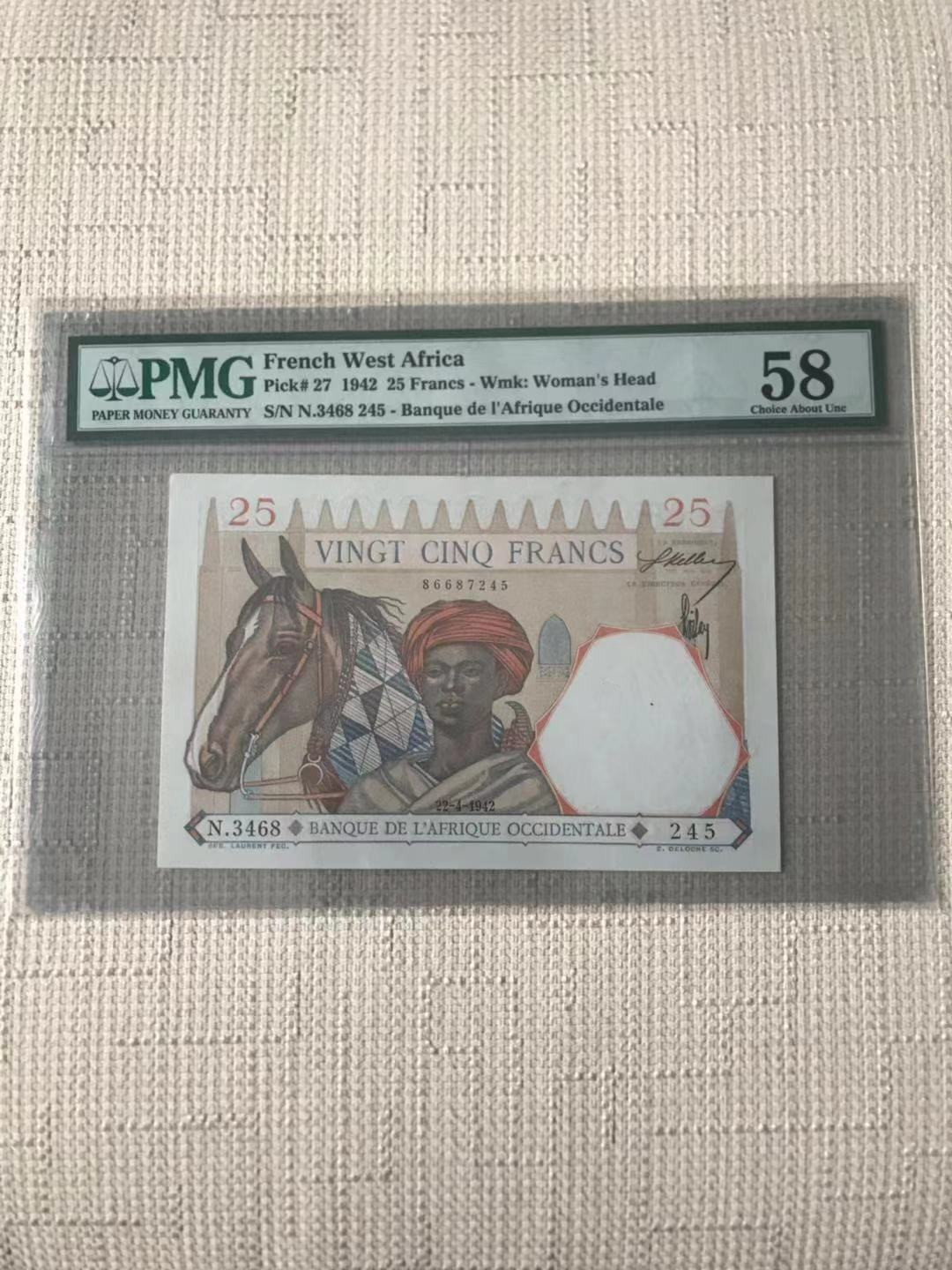 【收藏联盟】第110期拍卖——悠远岛歌 法属西非 1942年 25法郎 p27 PMG58 大金狮