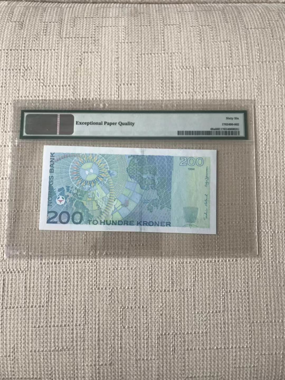 【收藏联盟】第110期拍卖——悠远岛歌 【初版】挪威 1994年 200克朗 p48a PMG66EPQ 