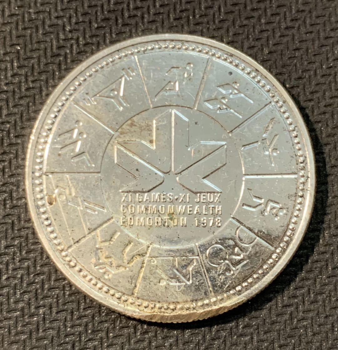 紫瑗钱币—微拍第三期  加拿大 1978年 第11届英联邦运动会 1元 银币 23.33克 0.5银 边有磕