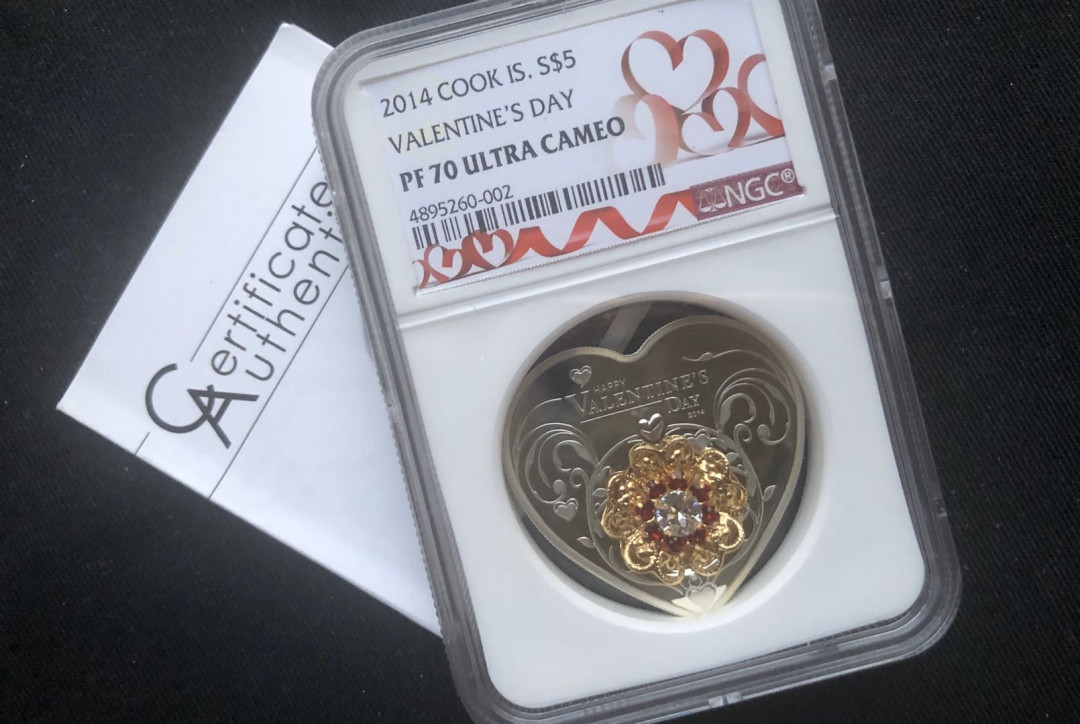 【币观天下】第九十三期钱币拍卖 【库克】2014情人节镶嵌施华洛斯奇水晶银币【首枚ngc70】