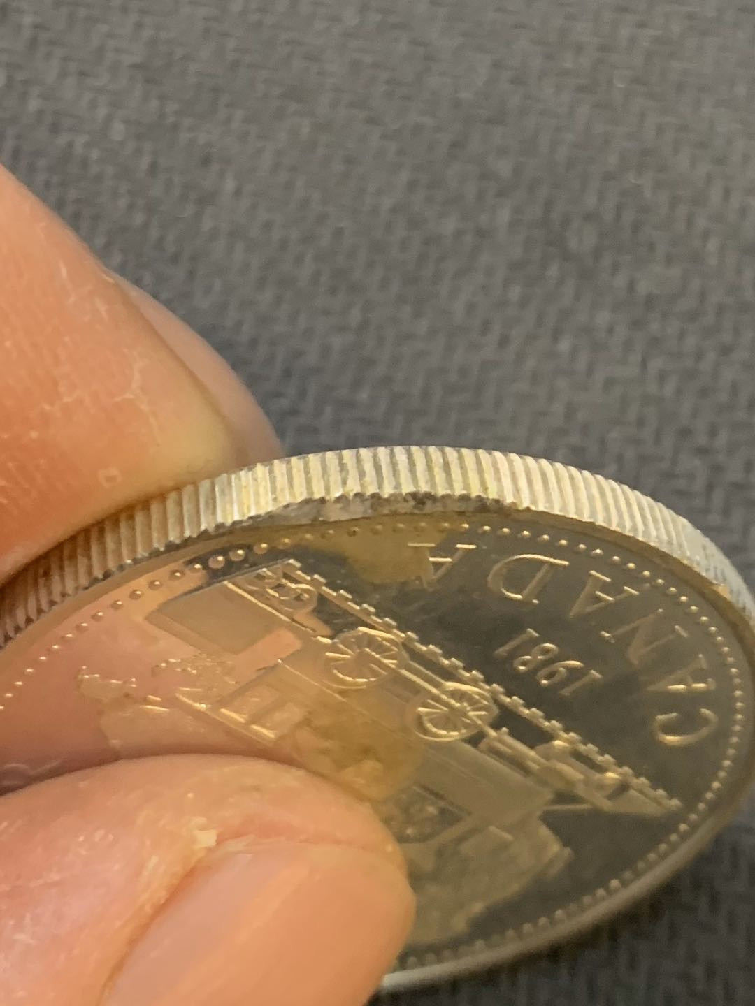 紫瑗钱币—微拍第11期  中外现代银币场 加拿大 1981年  火车 1元 精制 23.33克 0.5银 边有小磕