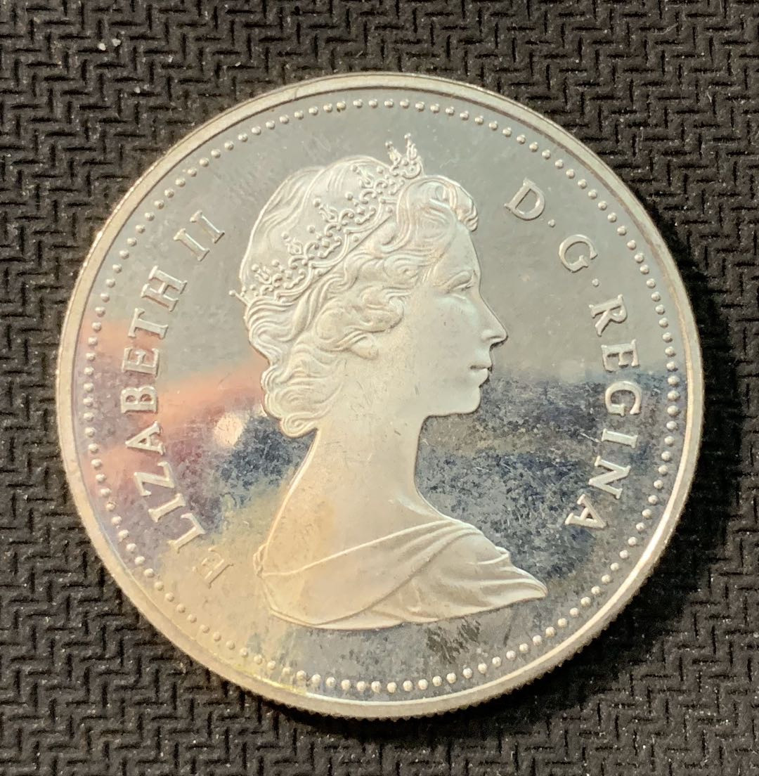 紫瑗钱币—微拍第11期  中外现代银币场 加拿大 1981年  火车 1元 精制 23.33克 0.5银 边有小磕