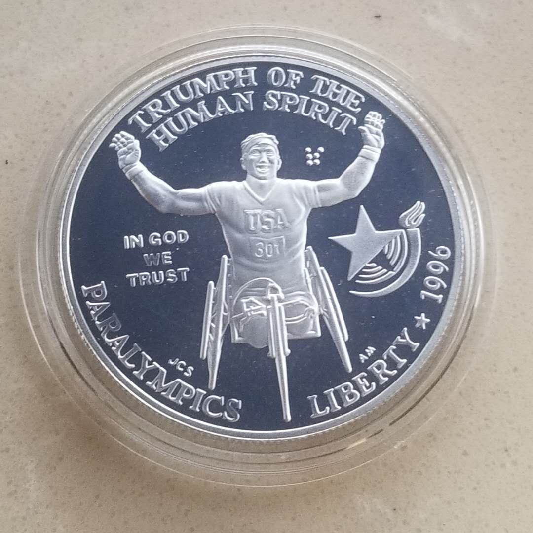 【币观天下】第九十五期钱币拍卖 克劳斯获奖币!美国1996年亚特兰大残奥会纪念银币