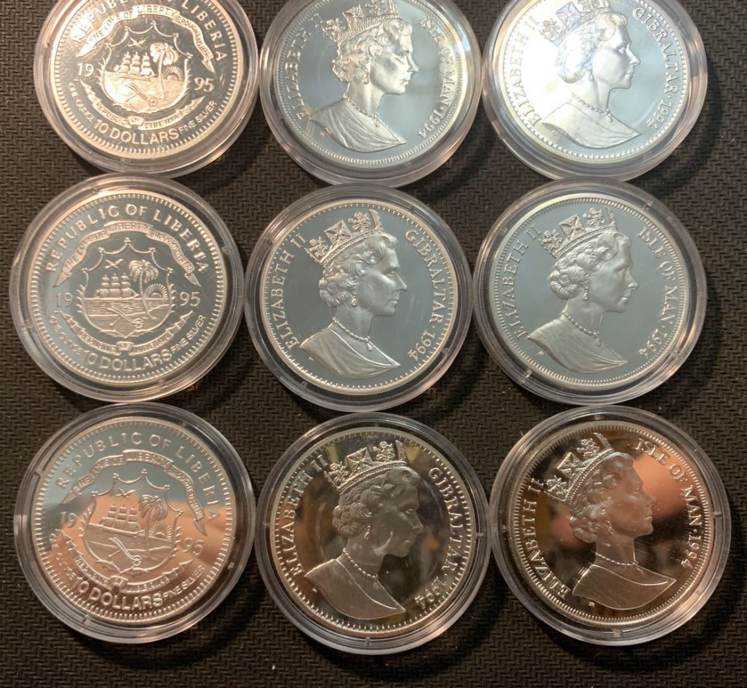 紫瑗钱币—微拍第12期  马恩岛和利比里亚 二战纪念 银币 共12枚 带解说册和盒子