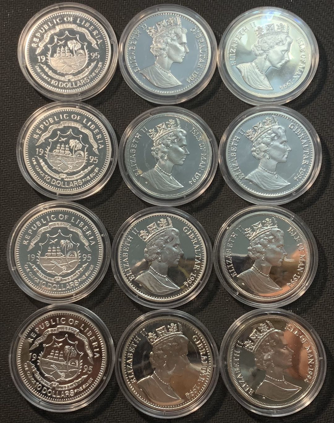 紫瑗钱币—微拍第12期  马恩岛和利比里亚 二战纪念 银币 共12枚 带解说册和盒子