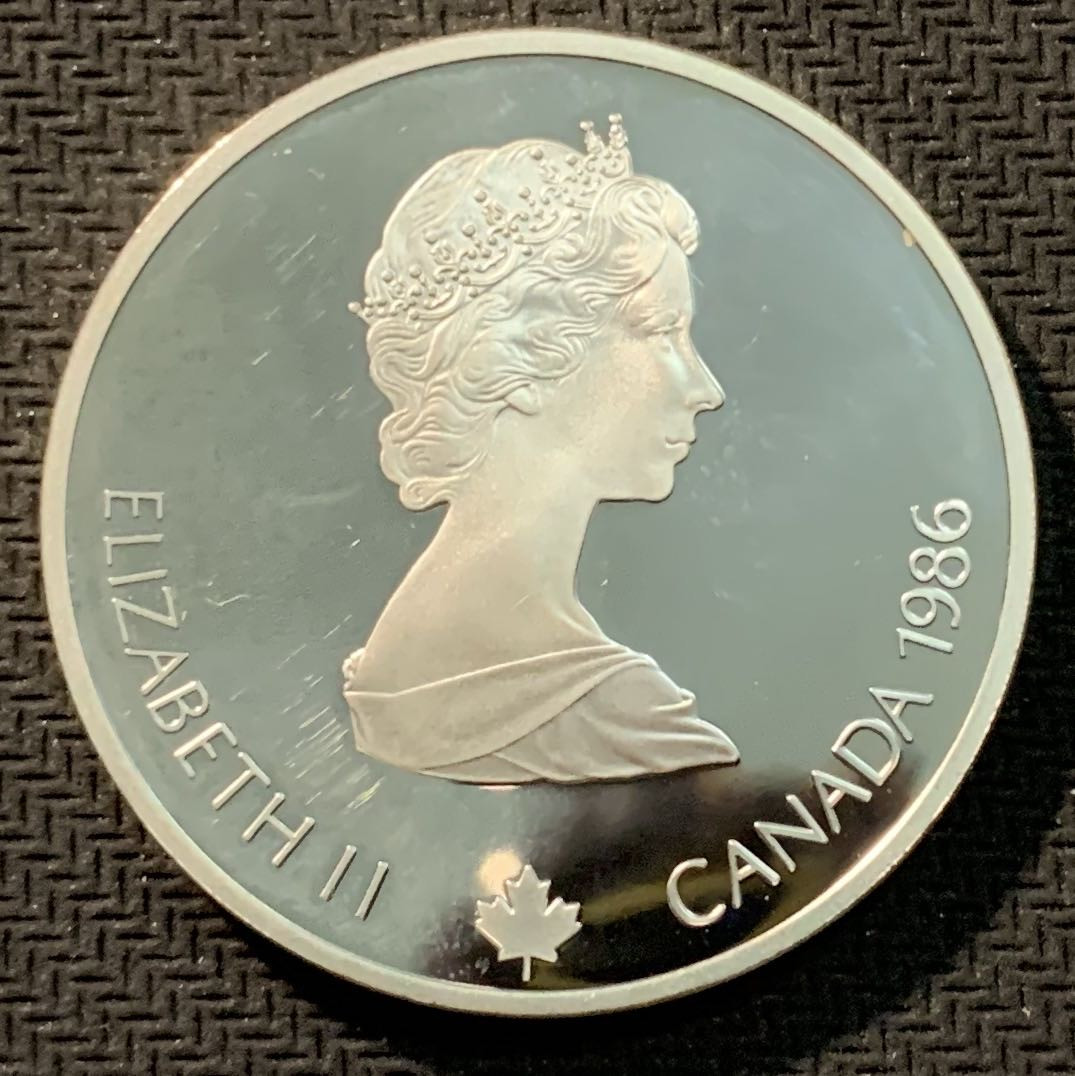 紫瑗钱币—微拍第12期  加拿大 1986年 卡尔加里冬奥会 卧射 20元  34.1克 0.925银 精制