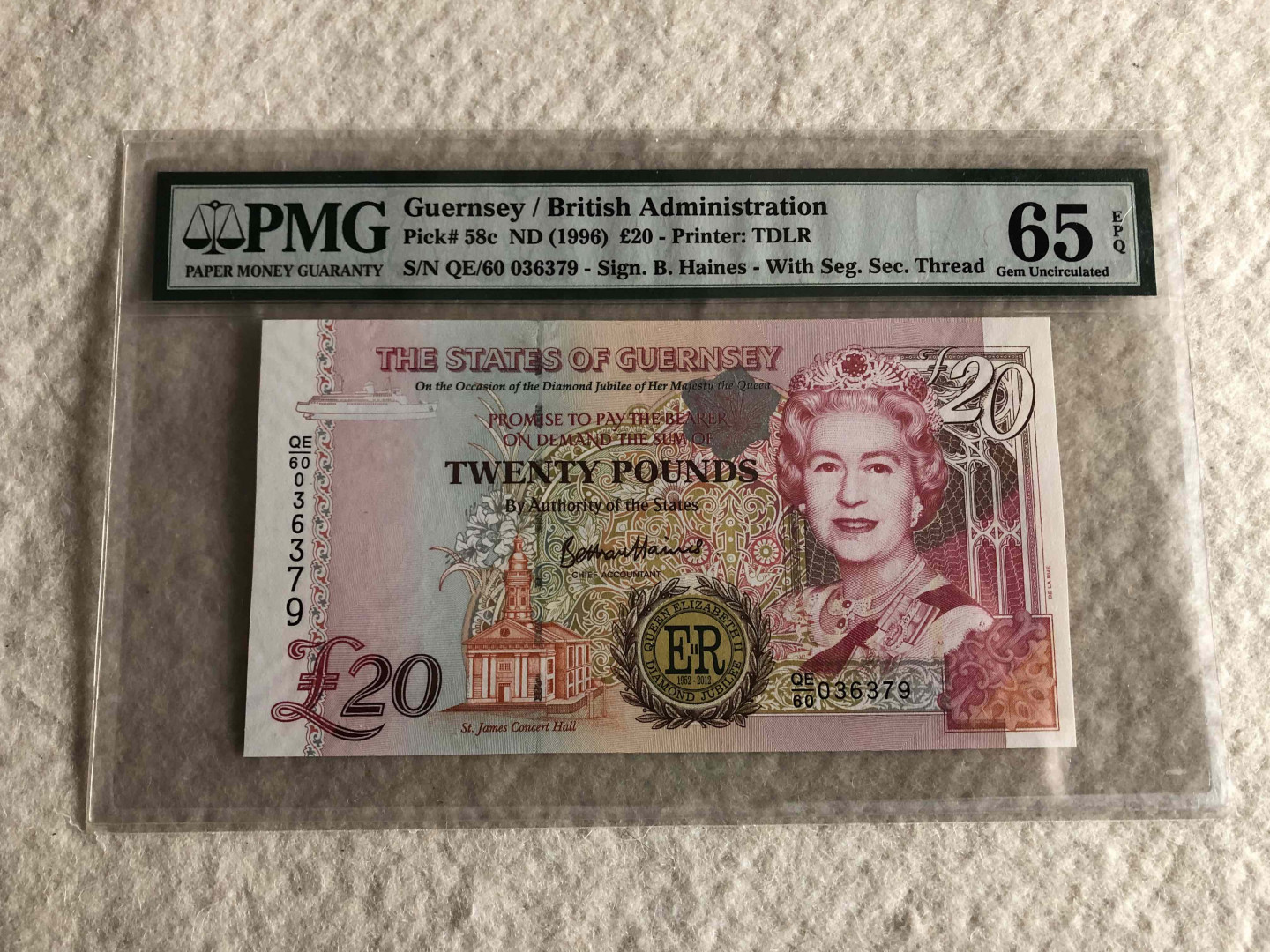 【收藏联盟】第114期拍卖（2019收官之作）——爪哇舞者 根西岛 1996年 20镑 PMG65EPQ  