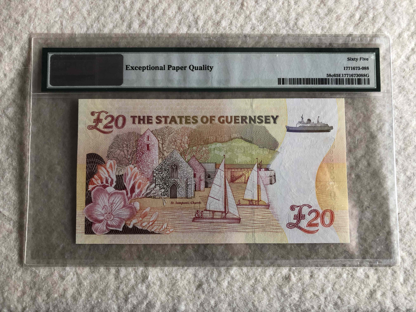 【收藏联盟】第114期拍卖（2019收官之作）——爪哇舞者 根西岛 1996年 20镑 PMG65EPQ  