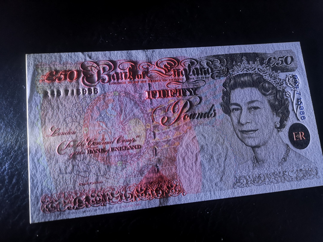 《外钞收藏家》第七十四期拍卖 英镑E序列50镑 绝品 凹版非常好的一张